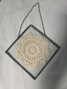 vintage Suncatcher leaded glass wall hanging featuring a handmade crochet doily.